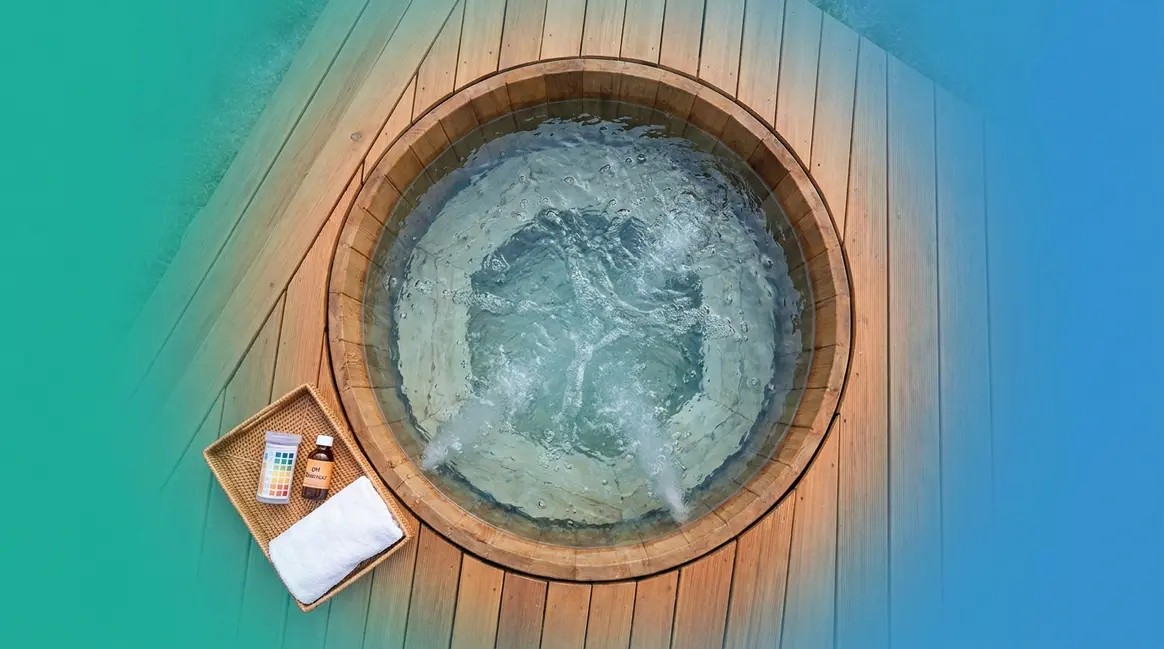 Hot tub maintenance tips guide showing clean spa with water testing kit on wooden deck