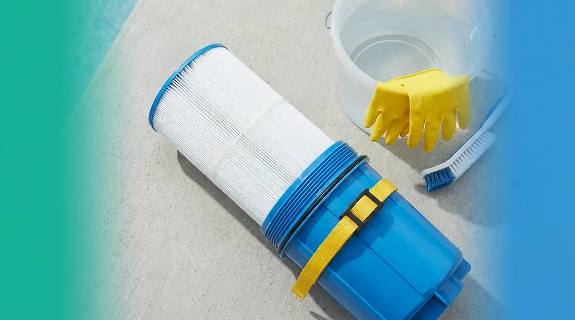 How to remove a stuck hot tub filter using rubber gloves and a strap wrench on a pool deck